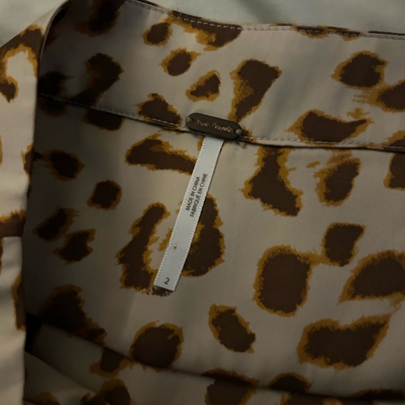 13. Free People Normani Bias
Leopard Print Satin Midi
Skirt
Size: 2 - Picture 5 of 6